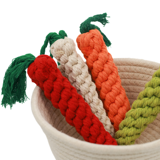Handwoven carrot-shaped pet toy made of durable cotton rope. Ideal for chewing and playing, it promotes dental health and provides hours of fun for your furry friend.