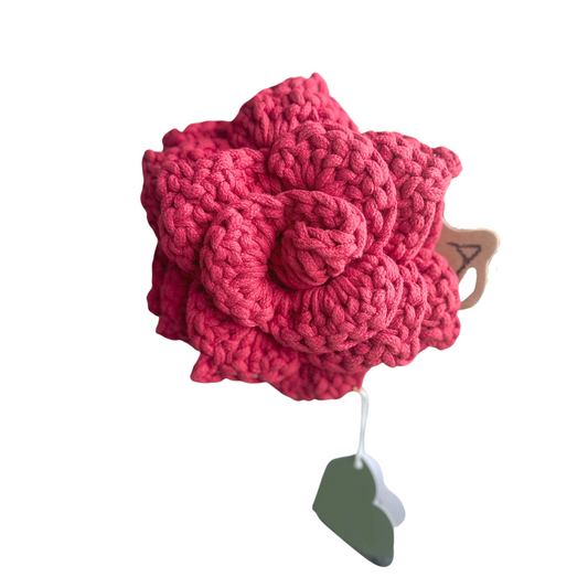 Crimson Blossom Tug Dog Toy - A vibrant, flower-shaped dog toy designed for tugging, chewing, and interactive play. Made from durable materials, this colorful toy offers both fun and stimulation for your pet.
