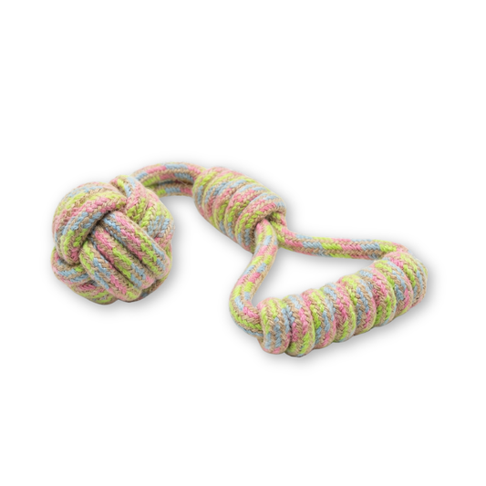 Colorful knotted rope toy on a white background