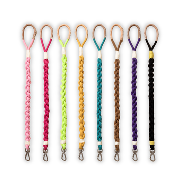 Set of colorful braided lanyards on a white background