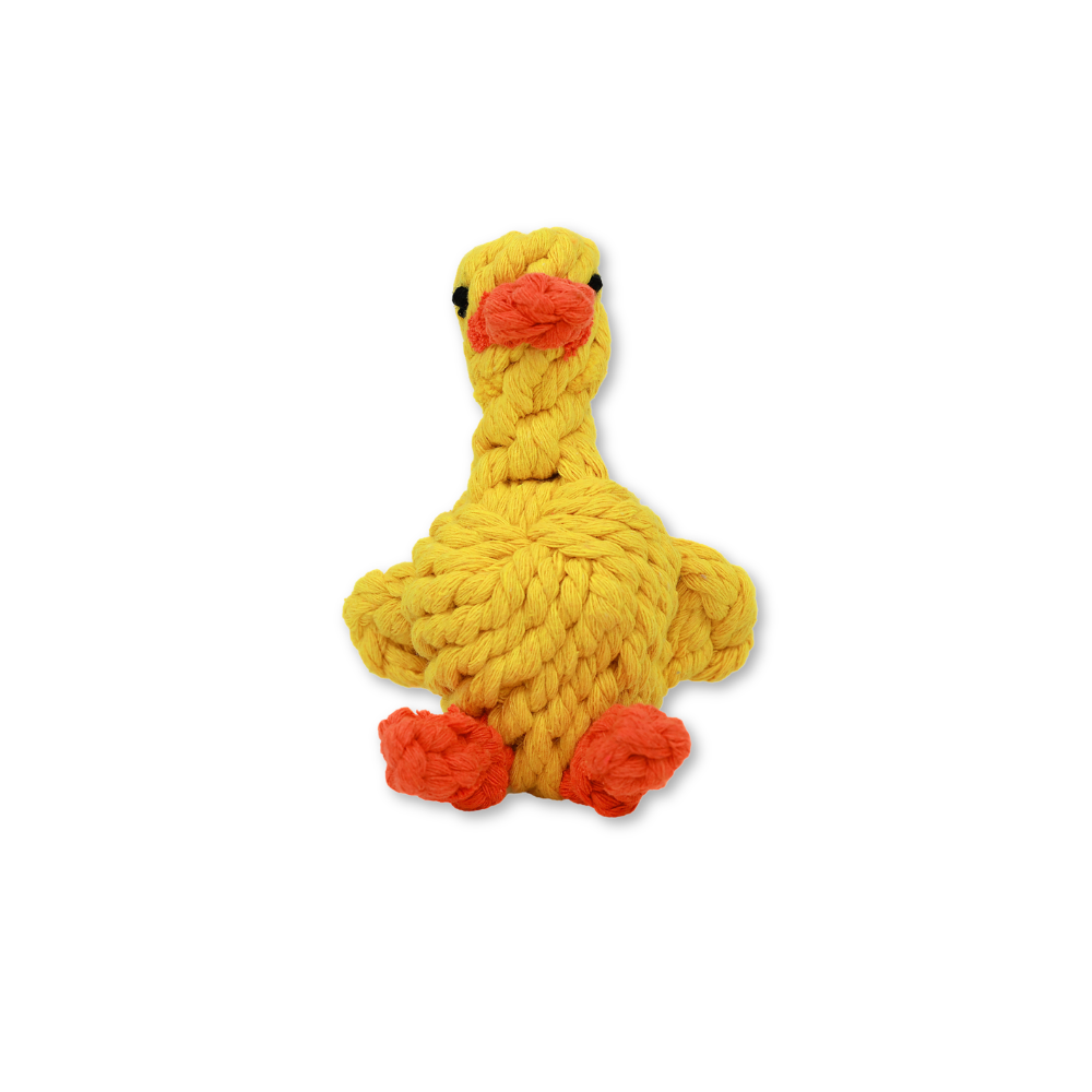 Yellow knitted duck toy with orange beak and feet on a white background