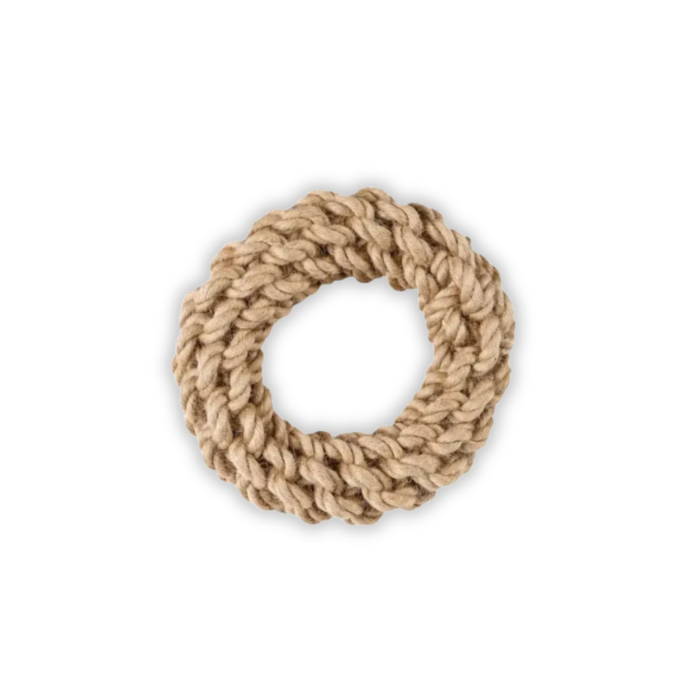 Round woven coaster made of natural fiber on a white background