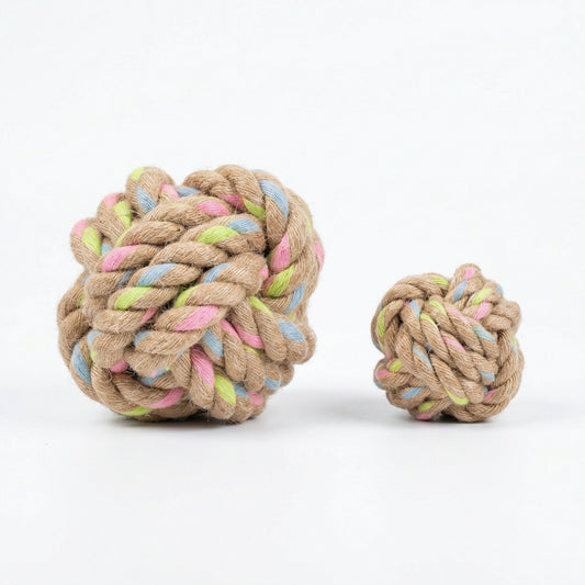 Two braided rope toys with colorful accents on a white background