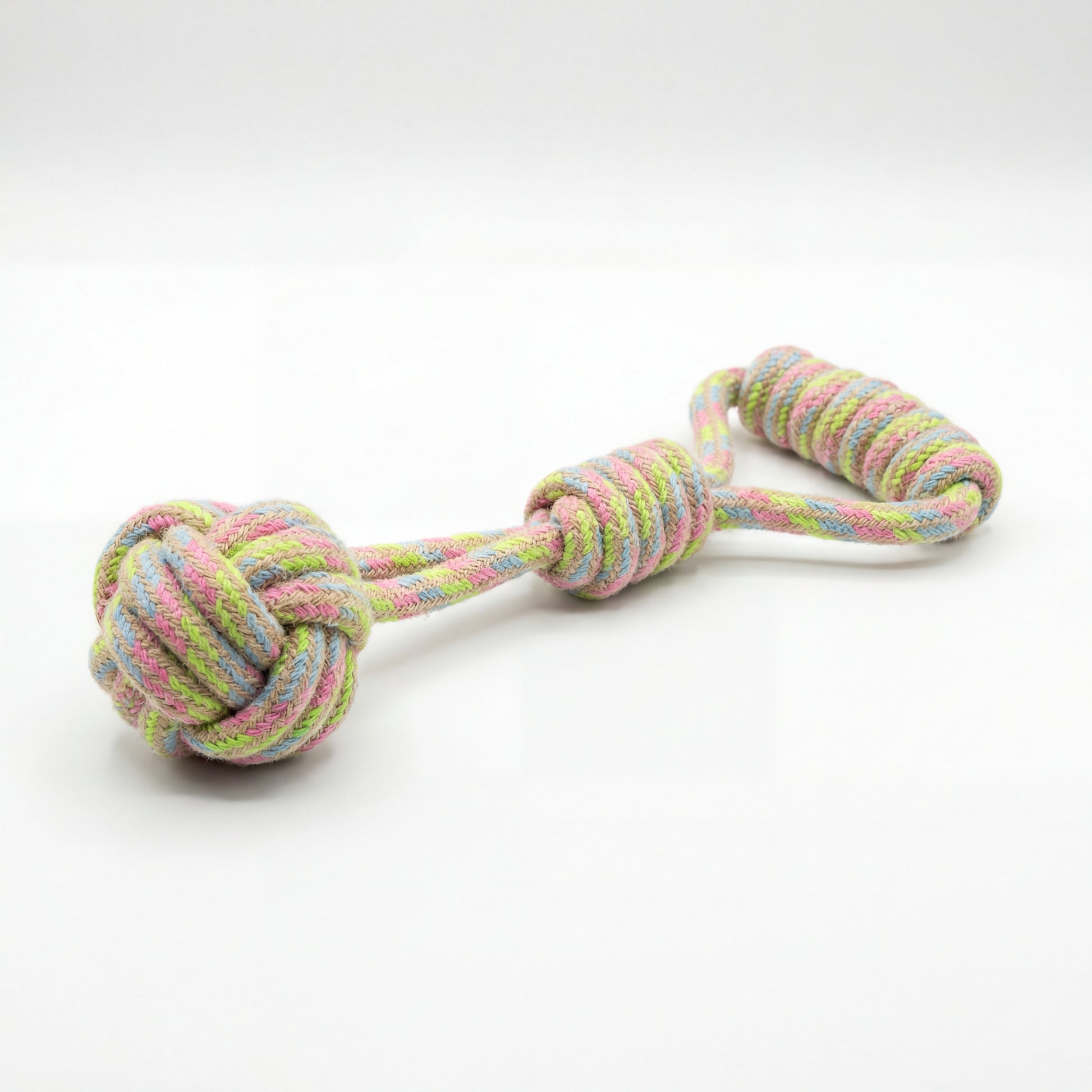Colorful knotted rope toy on a white background