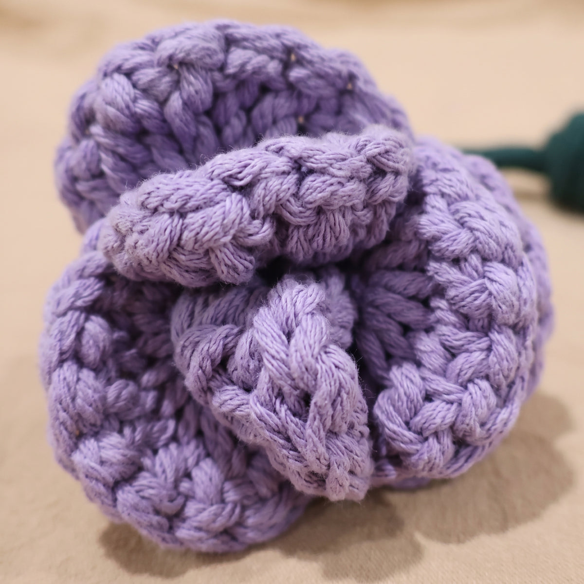 Close view of the handcrafted lavender rose snuffle tug toy