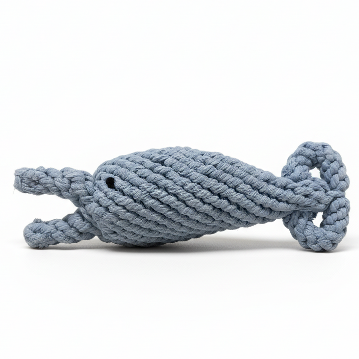 Blue rope toy shaped like a whale on a white background