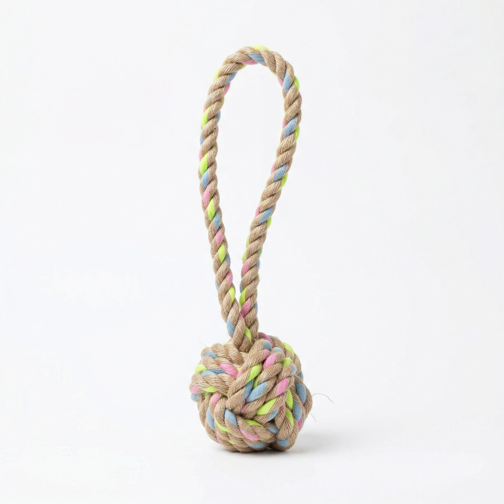 Dog toy with colorful rope and knot on a white background